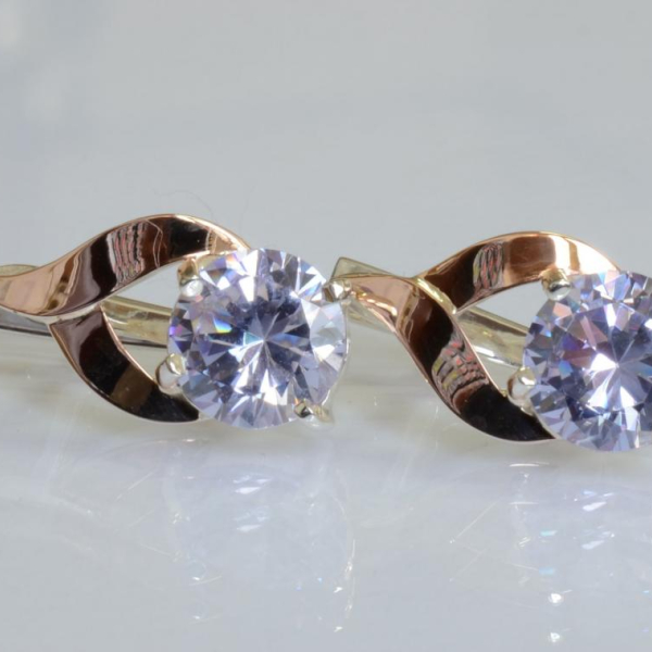 Срібні сережки з золотими пластинами