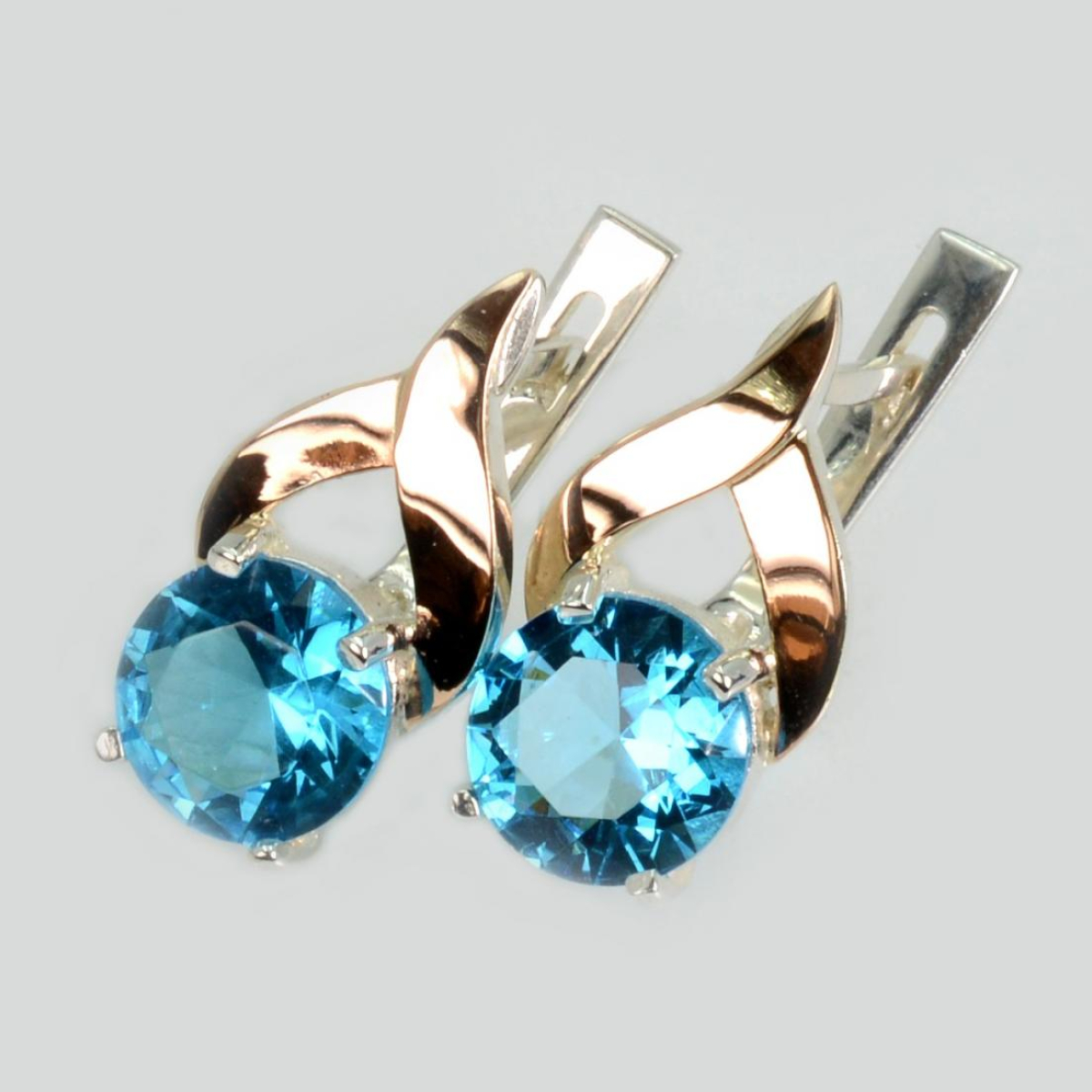 Срібні сережки з золотими пластинами