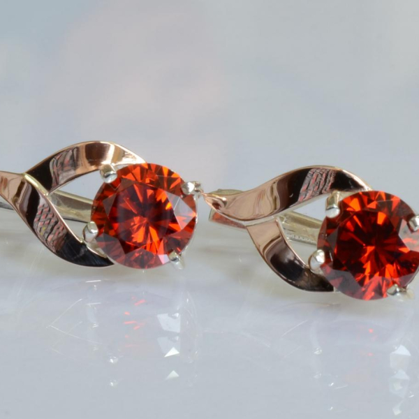 Срібні сережки з золотими пластинами