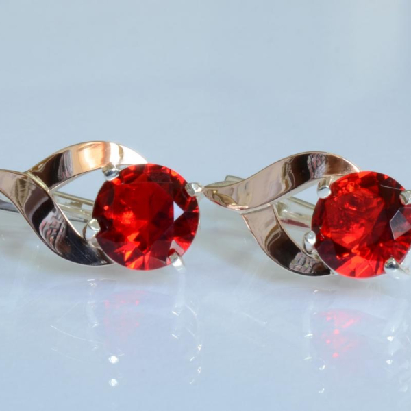 Срібні сережки з золотими пластинами