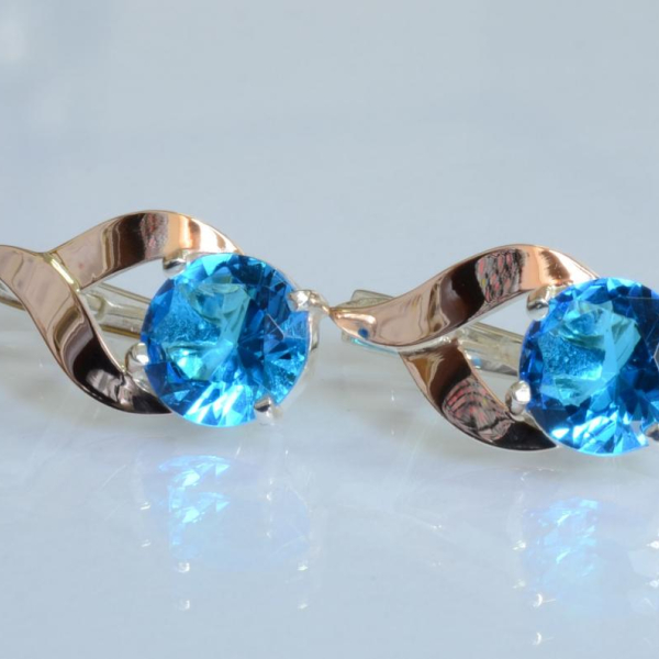 Срібні сережки з золотими пластинами