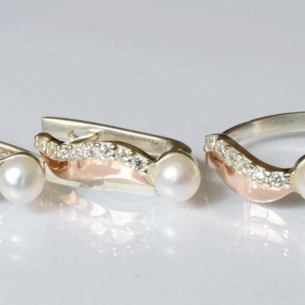 Срібний набір з золотими пластинами