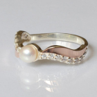 Срібна каблучка з золотими вставками