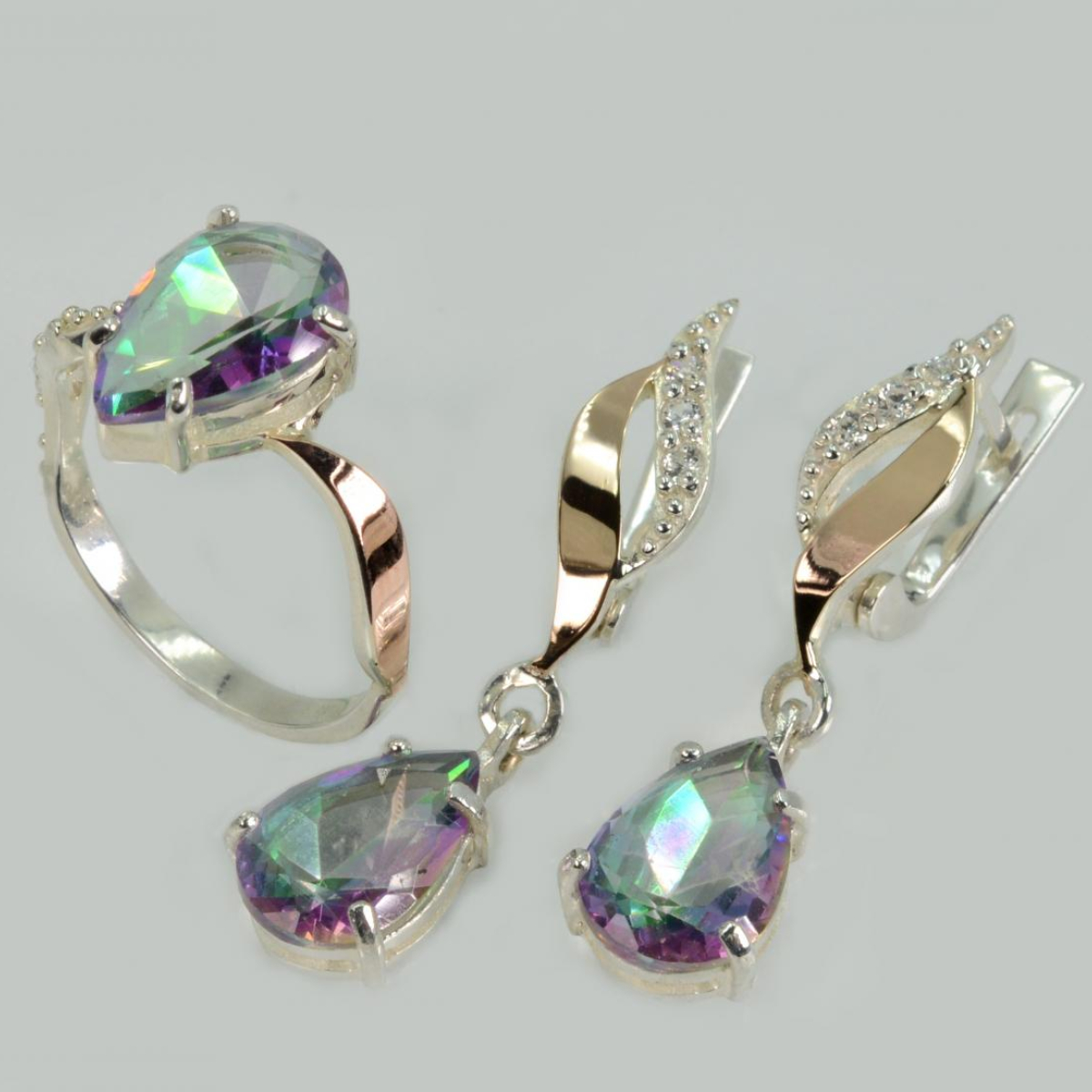 Срібний набір з золотими пластинами