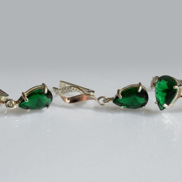 Срібний набір з золотими пластинами