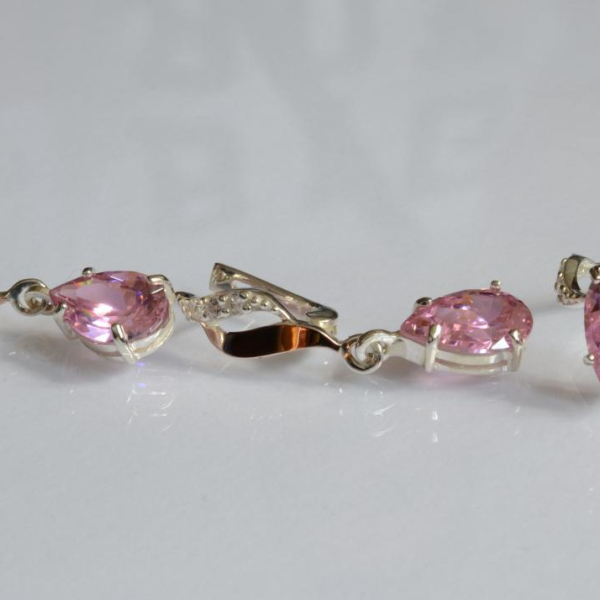 Срібний набір з золотими пластинами