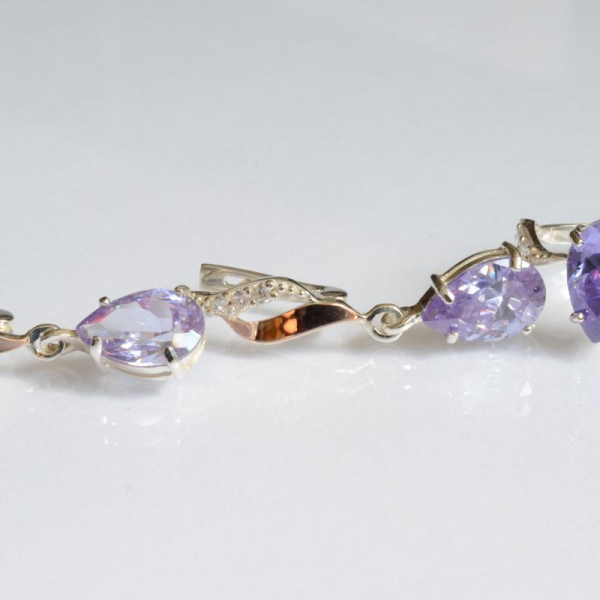 Срібний набір з золотими пластинами