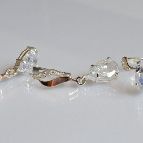 Срібний набір з золотими пластинами