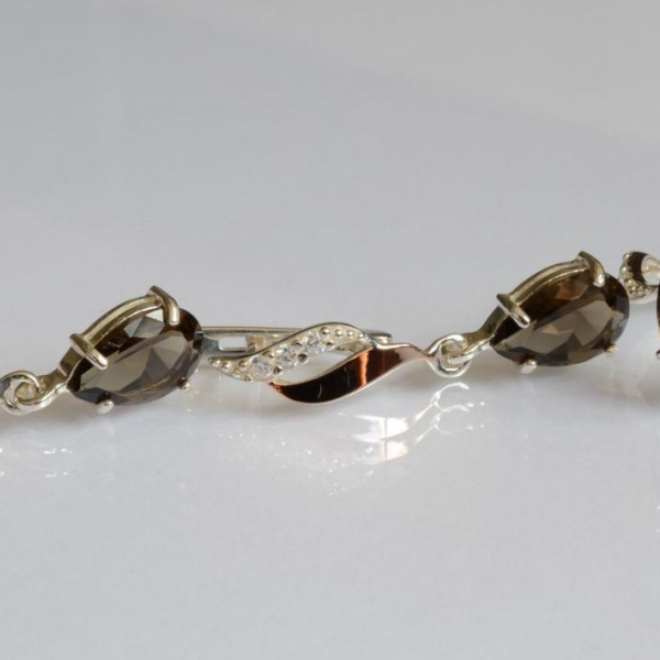 Срібний набір з золотими пластинами