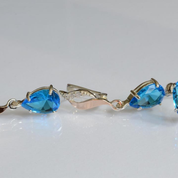 Срібний набір з золотими пластинами