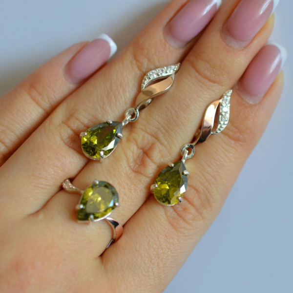 Срібний набір з золотими пластинами