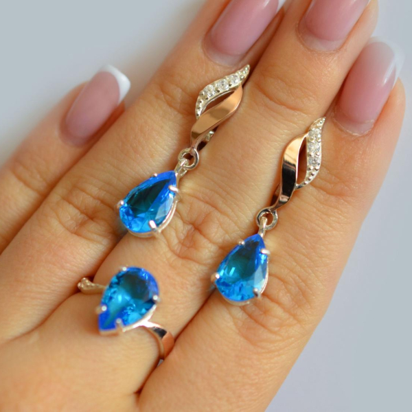 Срібний набір з золотими пластинами