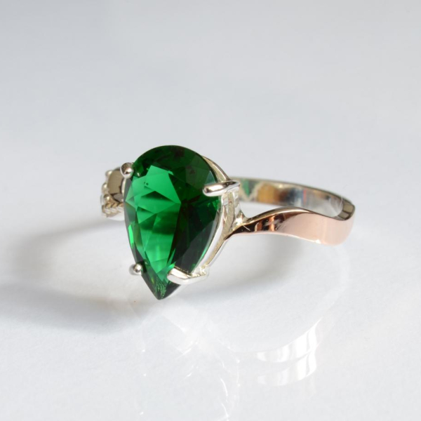 Срібна каблучка з золотими вставками