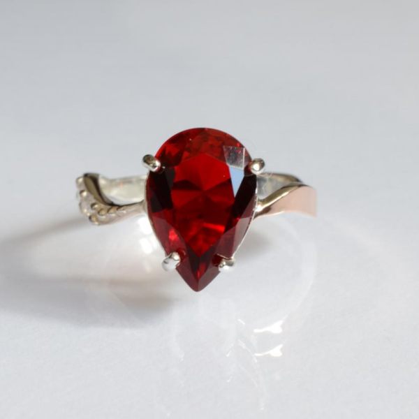 Срібна каблучка з золотими вставками