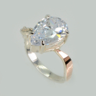 Срібна каблучка з золотими вставками