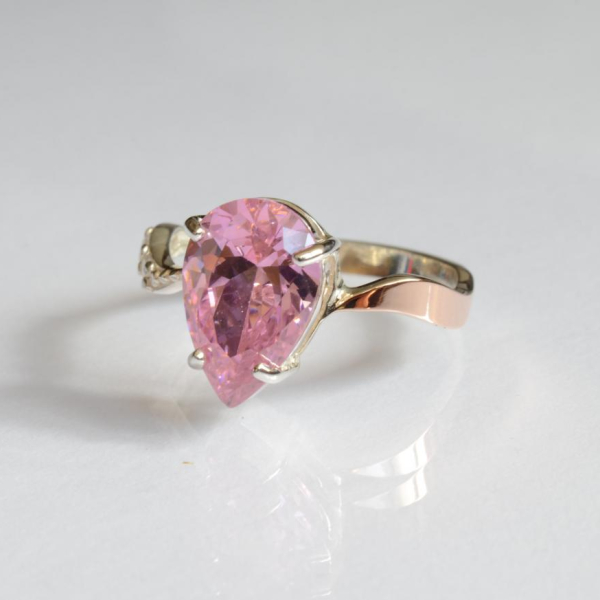 Срібна каблучка з золотими вставками