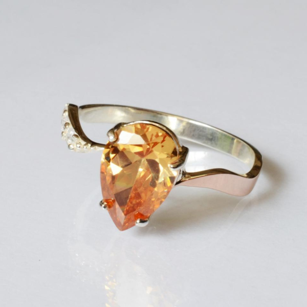 Срібна каблучка з золотими вставками