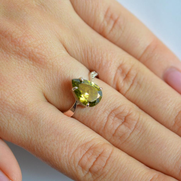 Срібна каблучка з золотими вставками