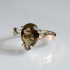 Срібна каблучка з золотими вставками