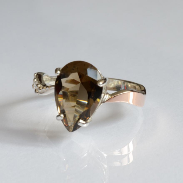 Срібна каблучка з золотими вставками