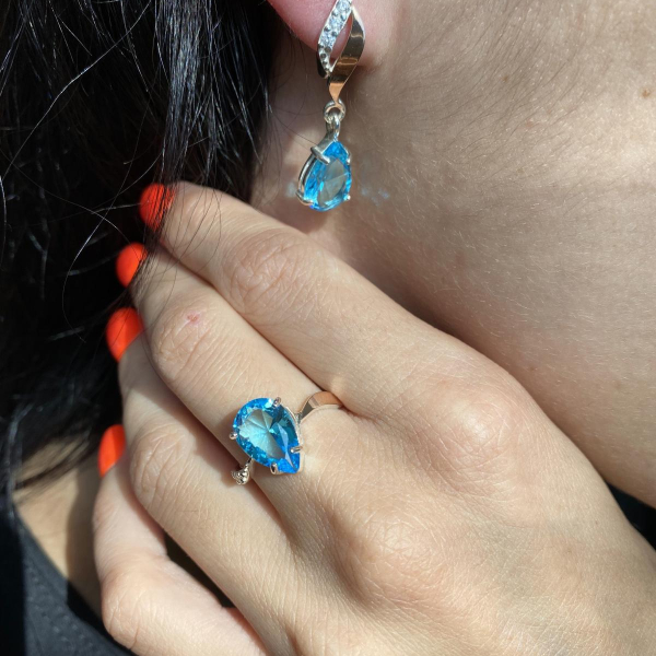 Срібна каблучка з золотими вставками