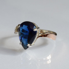 Срібна каблучка з золотими вставками