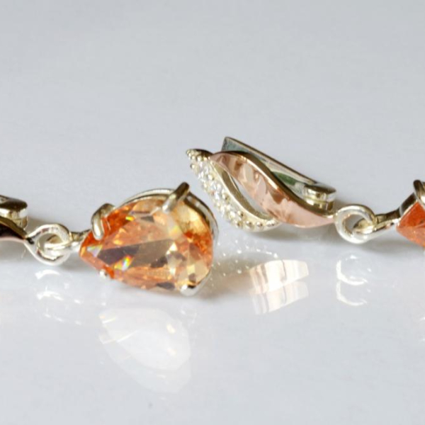 Срібні сережки з золотими пластинами