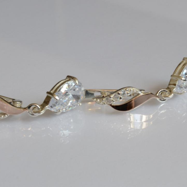 Срібні сережки з золотими пластинами