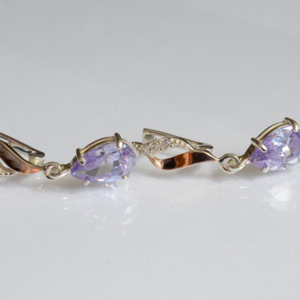 Срібні сережки з золотими пластинами