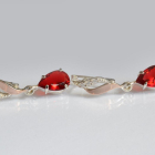 Срібні сережки з золотими пластинами