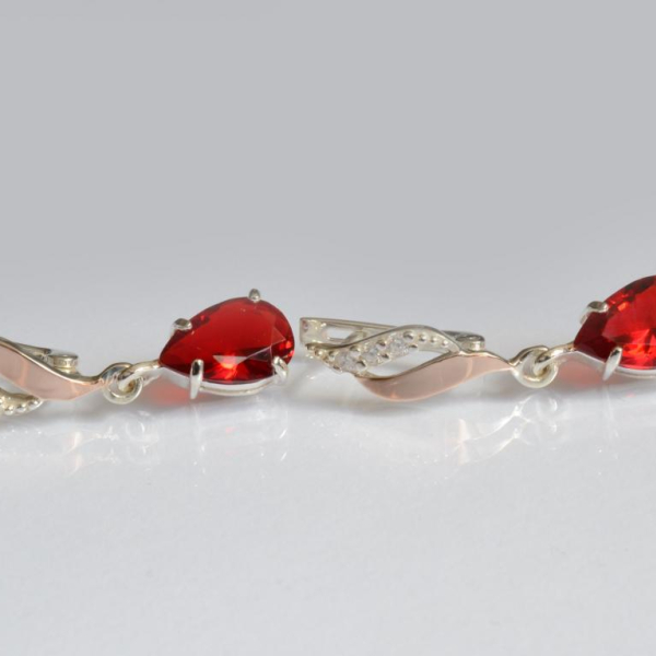 Срібні сережки з золотими пластинами