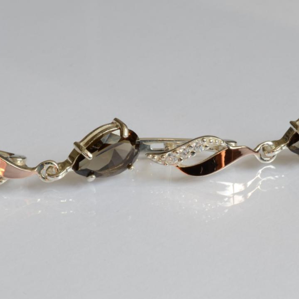 Срібні сережки з золотими пластинами