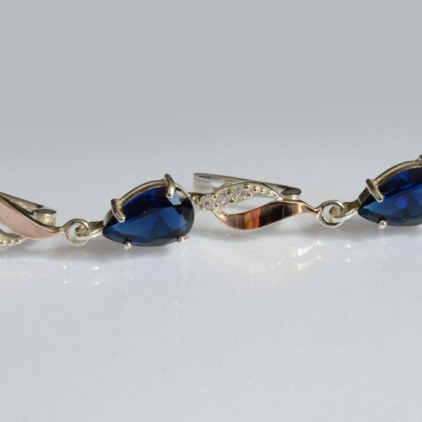 Срібні сережки з золотими пластинами