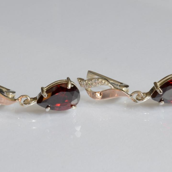 Срібні сережки з золотими пластинами