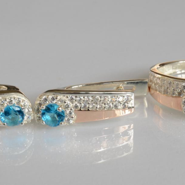 Срібний набір з золотими пластинами