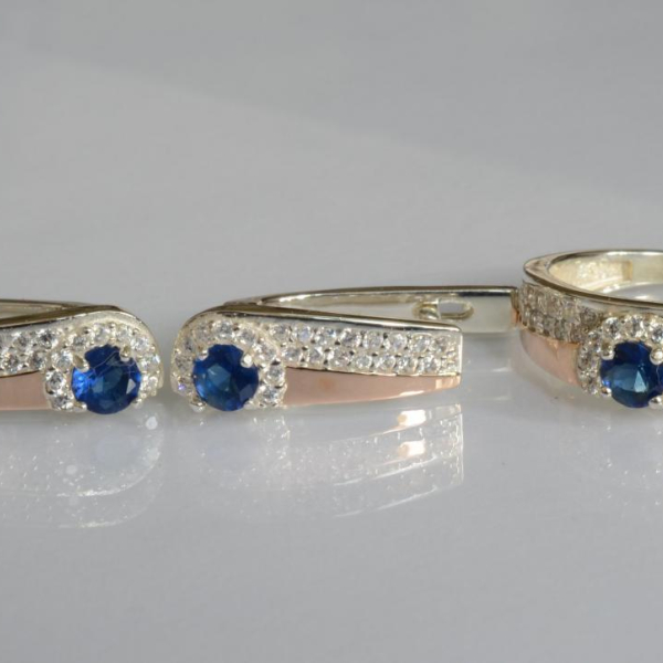 Срібний набір з золотими пластинами