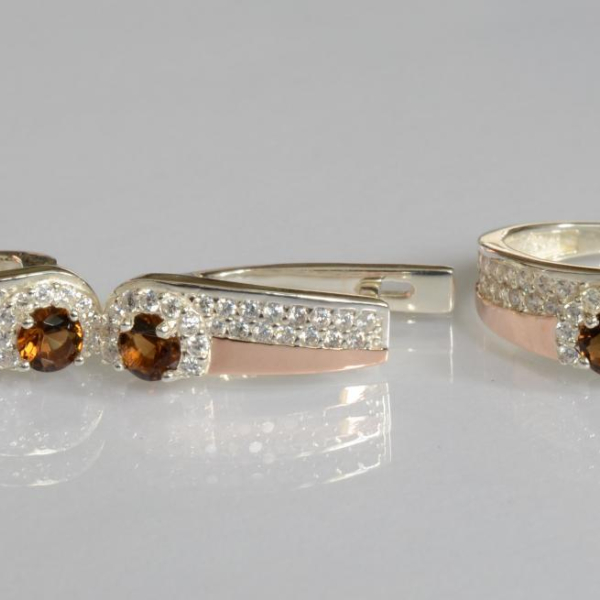 Срібний набір з золотими пластинами