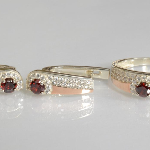 Срібний набір з золотими пластинами