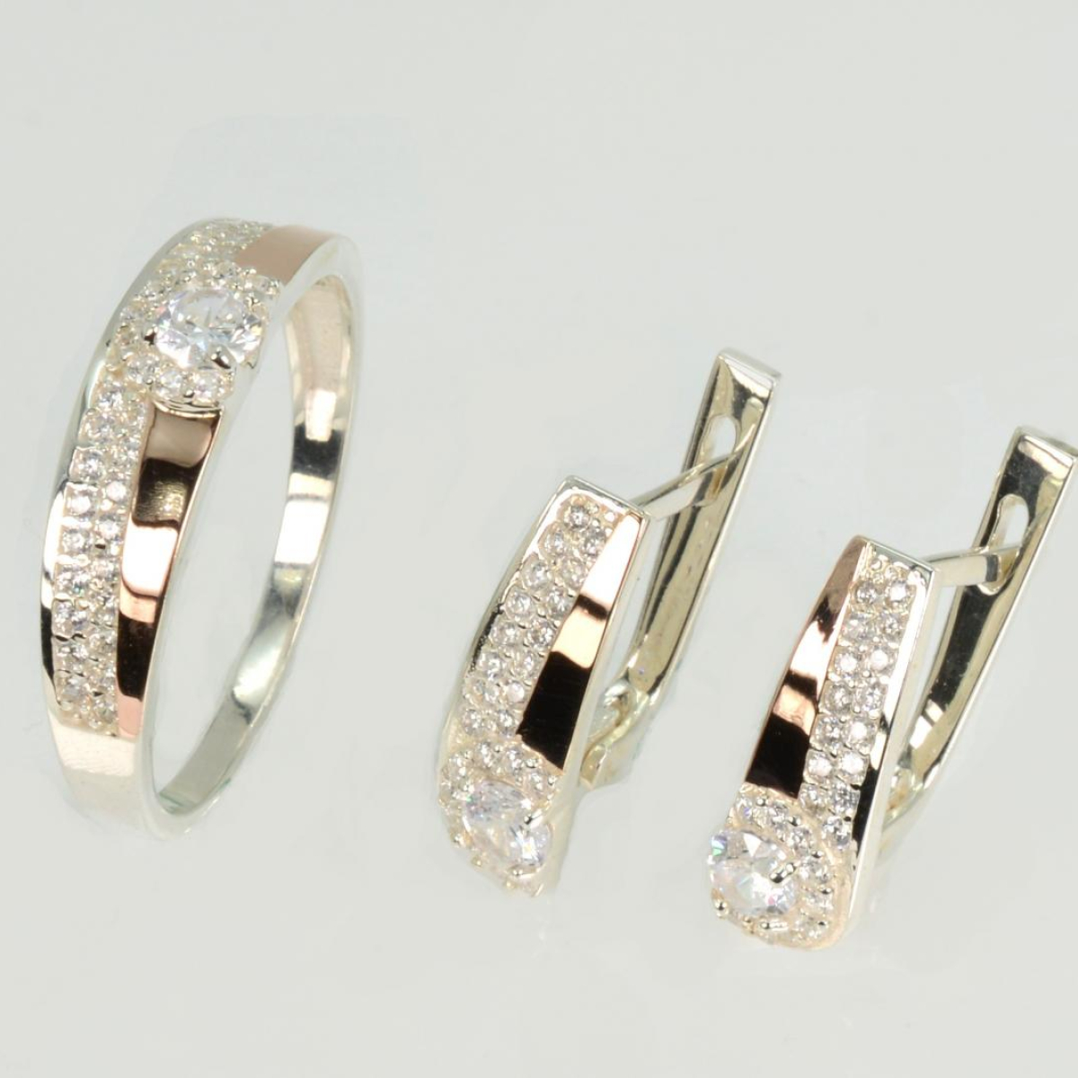 Срібний набір з золотими пластинами