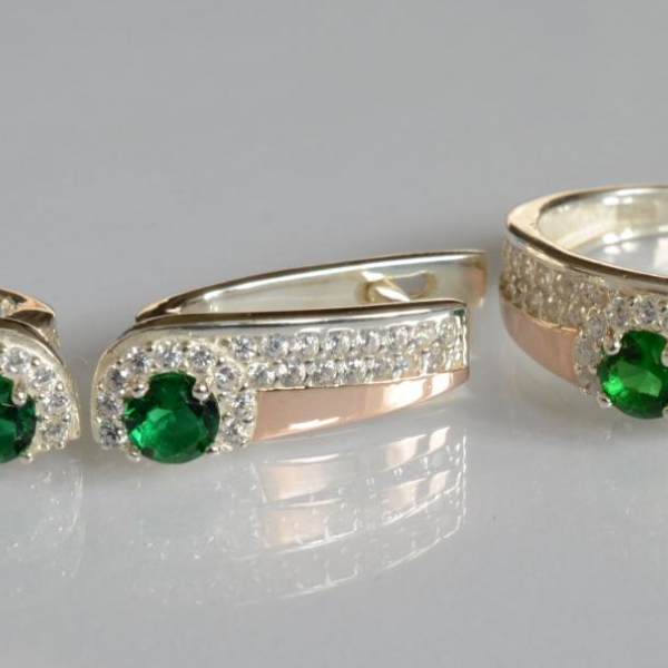 Срібний набір з золотими пластинами