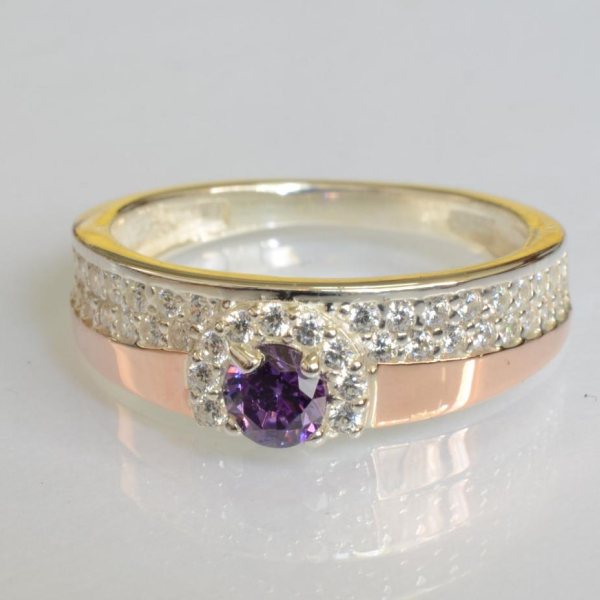 Срібна каблучка з золотими вставками