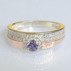 Срібна каблучка з золотими вставками