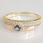 Срібна каблучка з золотими вставками