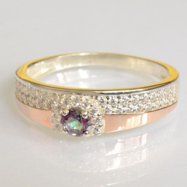 Срібна каблучка з золотими вставками