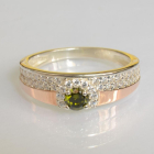 Срібна каблучка з золотими вставками