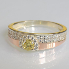 Срібна каблучка з золотими вставками