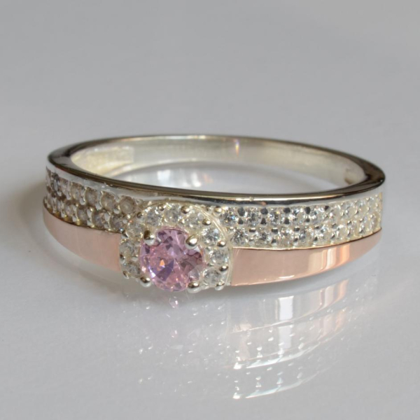 Срібна каблучка з золотими вставками