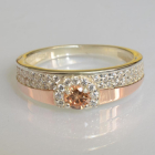 Срібна каблучка з золотими вставками