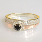 Срібна каблучка з золотими вставками