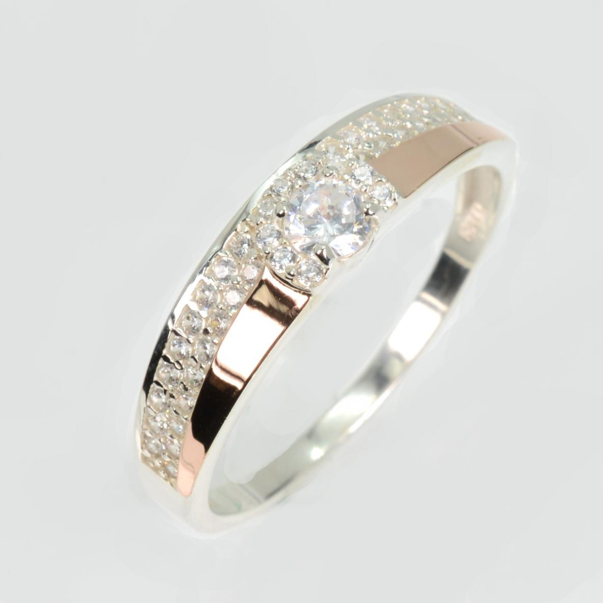 Срібна каблучка з золотими вставками